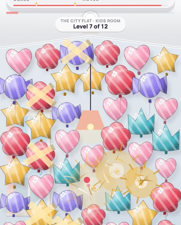 The Kids room in play: the ceiling full of foil balloons.
