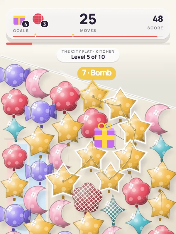 A level in the Kitchen: a star chain held, “7 · Bomb” over it.