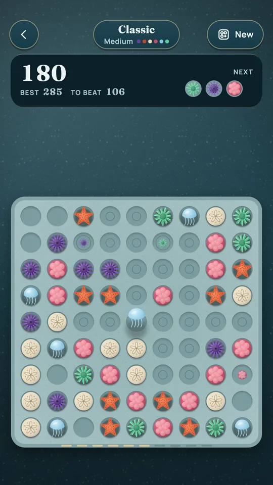 Classic on Reef: a marble picked, the score, the best to beat and the marbles coming next.